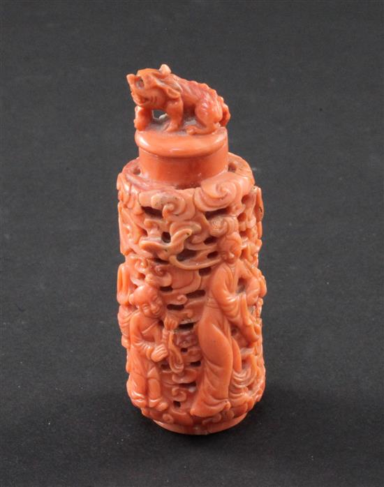 A Chinese coral snuff bottle, late 19th / early 20th century, 7.5cm, stopper glued